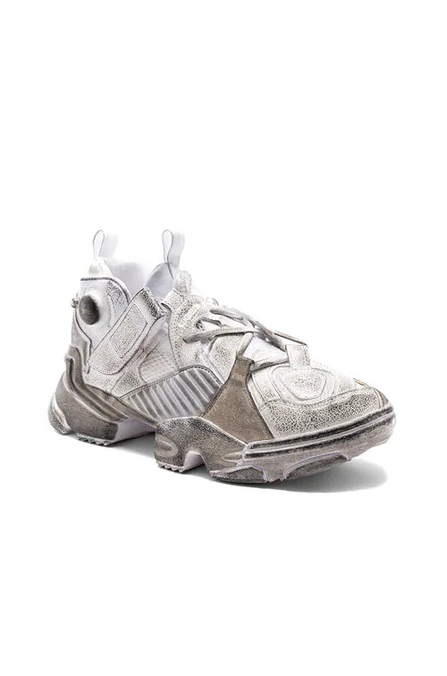 VETEMENTS
Genetically Modified Pump Sneakers